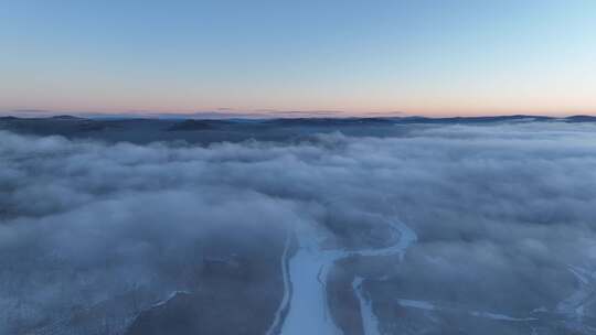 航拍冷空气迷漫的林海雪原