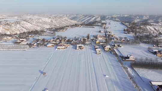 雪后村庄田野航拍全景