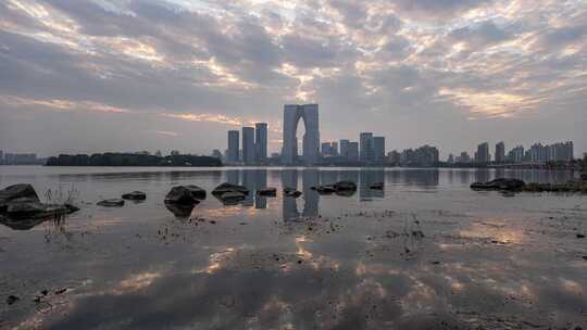 江苏苏州金鸡湖东方之门CBD日落夜景延时