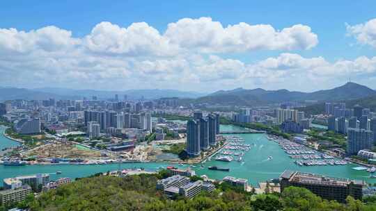 海南三亚航拍蓝天白云三亚湾城市凤凰岛海洋