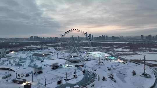 航拍哈尔滨冰雪大世界晚霞夕阳朝霞灯光夜景