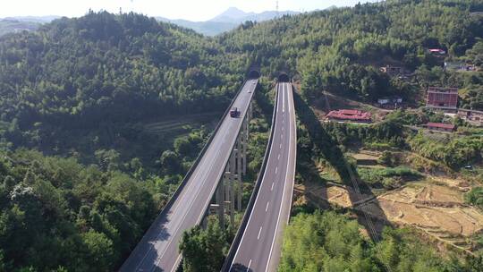 高速公路汽车进出隧道航拍高架桥货车高速路视频素材模板下载