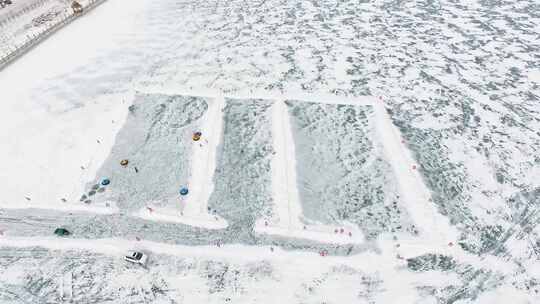 4K航拍东北雪乡村庄冰雪旅游冰上运动滑冰