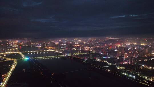 城市航拍洛阳阴雨天后城市云海夜景建筑