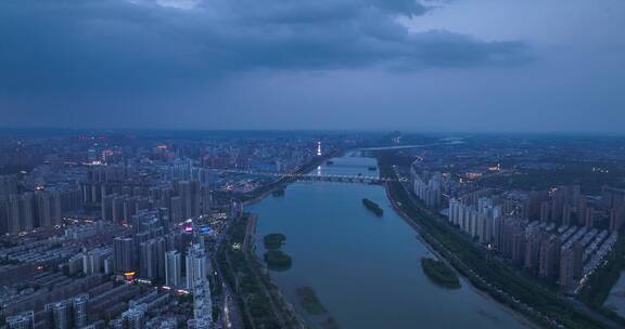 4k城市洛阳河流航拍蓝调时刻城市夜景