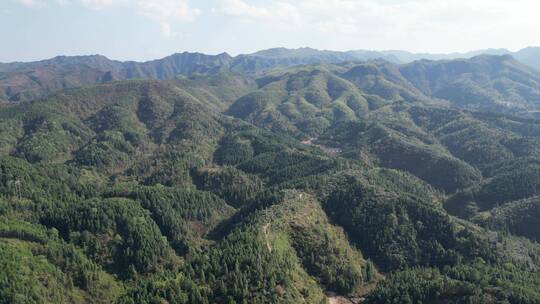 连绵起伏山川丘陵蓝天白云航拍