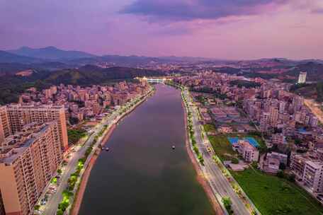 信宜一河两岸含章桥日落夜景