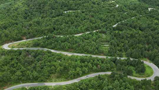 丽江弯曲的盘山公路航拍