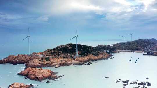 泉州惠安崇武镇 海中的岛屿 海边风力发电视频素材模板下载