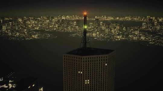 航拍夜晚塔顶的信号灯闪烁