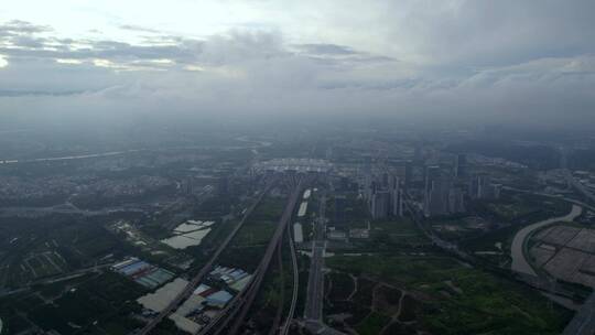 广州番禺南站蓝天白云交通枢纽航拍穿过云层