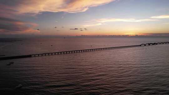 广西北海涠洲岛海边蓝桥日落晚霞航拍