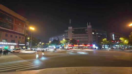 岔路口车流电动车行人光轨夜景延时宣传片