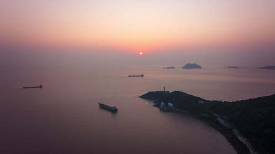 实拍延时航拍日出海面岛屿轮船