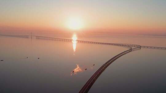 4k航拍山东青岛胶州湾跨海大桥日出视频素材模板下载