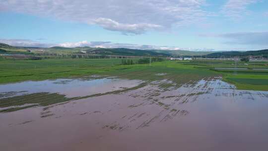 4k航拍雨后被淹的农田