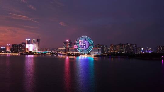 深圳宝安欢乐港湾摩天轮夜景海面前冲