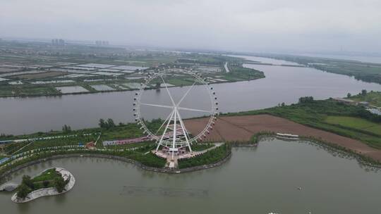 城市航拍湖南岳阳洞庭湖摩天轮地标建筑