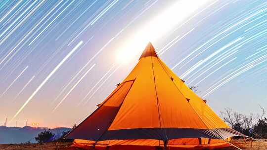 野外露营帐篷与星轨夜景