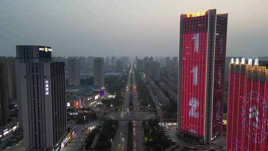 河南新乡市城市夜幕降临夜景灯光航拍视频素材模板下载