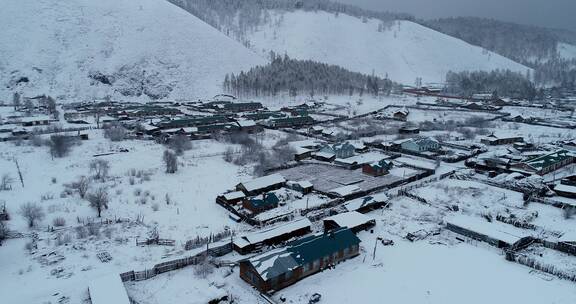 航拍东北林区山里人家雪景