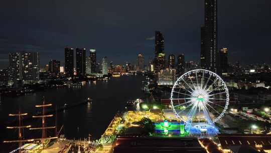 航拍泰国曼谷亚洲河滨夜市湄南河夜景风光