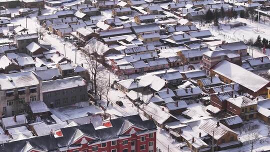 雪乡东北风景白雪覆盖下的村庄全貌航拍