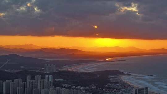 航拍威海高区西海岸城市远山海岸夕阳延时