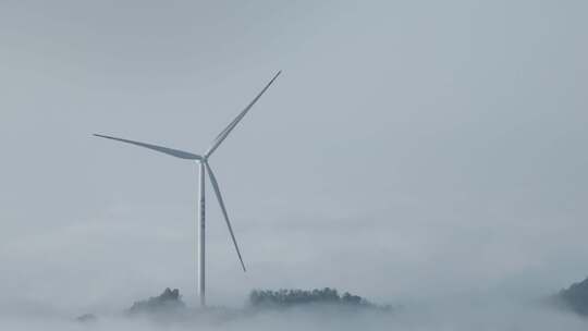 云雾云海山上的风力发电风车航拍