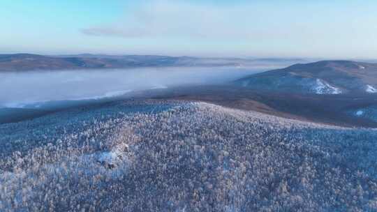 航拍林海雪原高山雾凇晨光冻雾