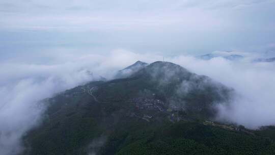 航拍高山云海和美丽乡村