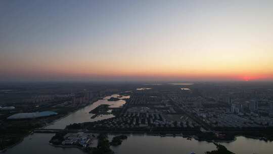 城市夕阳晚霞日落航拍东营日落