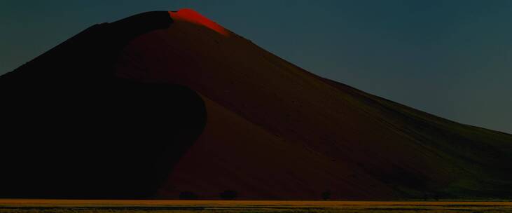 沙漠山丘日出红色延时夕阳风景旅游观光