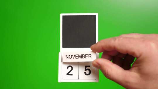 11.绿色背景上日期为11月25日的日历