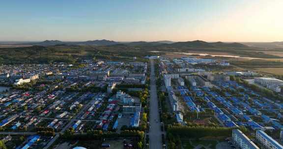 黑龙江饶河胜利农场街道城市日出航拍