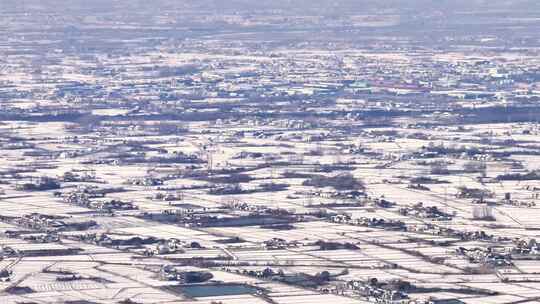 航拍乡镇雪景学校建筑田地大桥别墅河流房屋