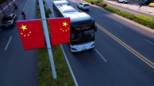 航拍国庆道路红旗装饰视频素材模板下载