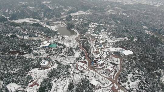 航拍南方丘陵乡村冬天雪景