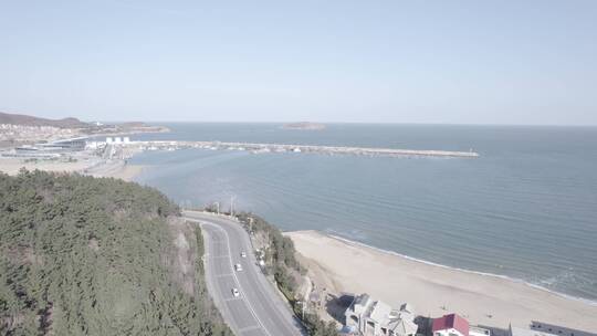 航拍蓝天公路海边旅游4K