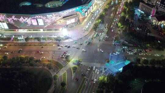 义乌吾悦广场城市十字路口夜景车流风光航拍