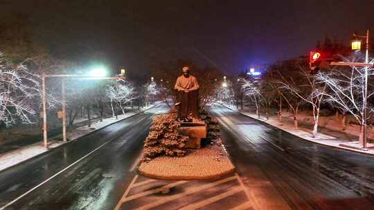 航拍鉴真路扬州雪景夜景鉴真像飘雪