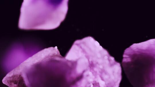 紫色宝石落下相互撞击弹起美妆视频素材模板下载