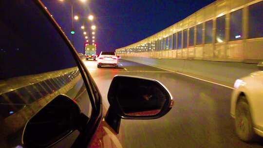 城市夜晚汽车在马路行驶夜景视频素材