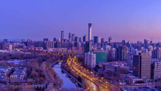 冬季北京国贸城市天际线与车流夜转日延时