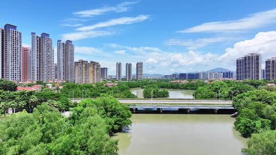 航拍海南三亚河岸城市风光