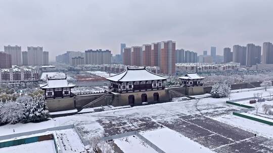 航拍洛阳定鼎门雪景视频素材模板下载