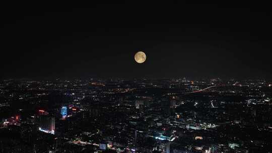 广州城市月亮延时夜景城市中秋节月亮升起来