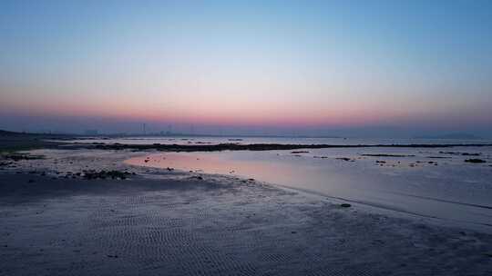 航拍夕阳下的海岸线