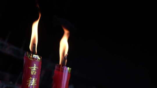 吉祥祈福的红色燃烧蜡烛