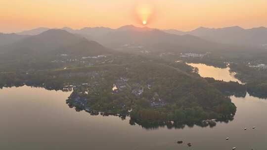 唯美夕阳西下杭州西湖苏堤航拍美景大自然风